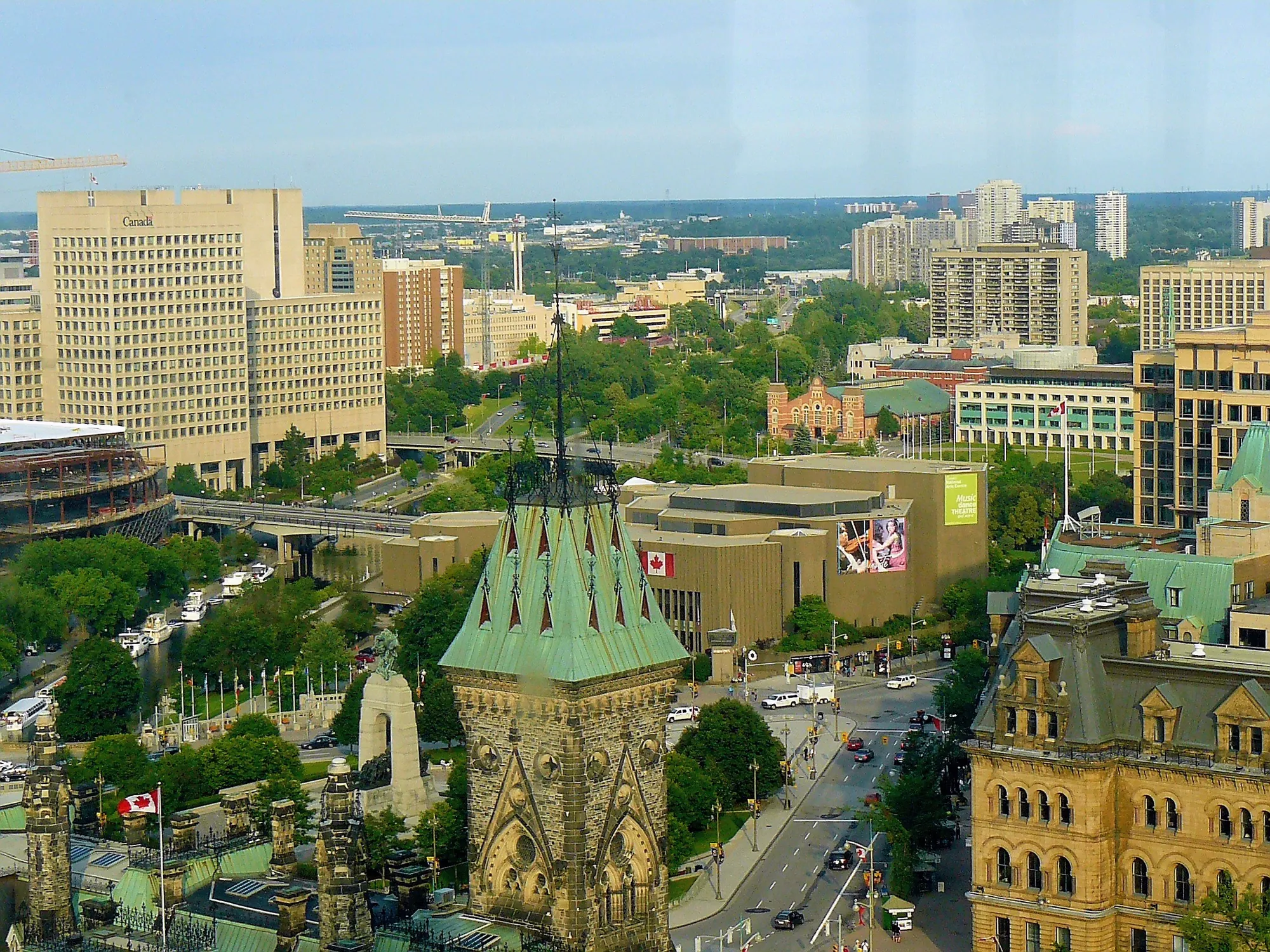 Downtown Ottawa from the Peace Tower, with the Château Laurier, the Rideau Canal, and the ByWard Market.