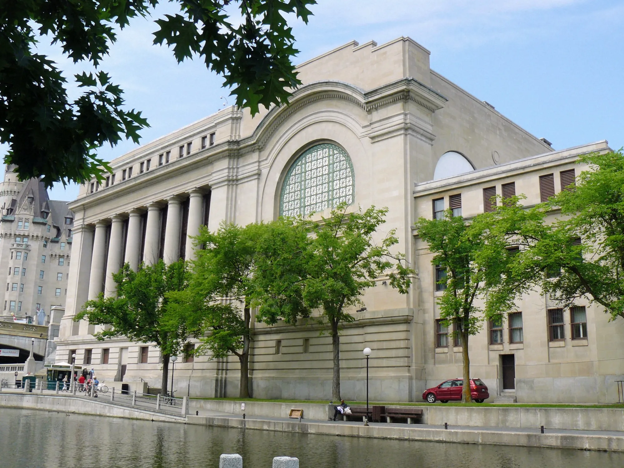 The former Government Conference Centre, now the Senate of Canada Building, seen from the Rideau Canal in Ottawa.